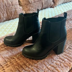 Soda women’s black faux leather ankle boots